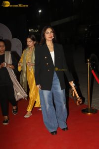 actress Bhumi Pednekar in a black suit and denim jeans at an event