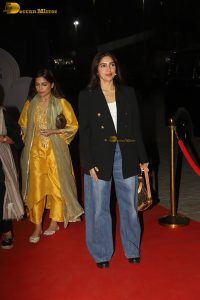 actress Bhumi Pednekar in a black suit and denim jeans at an event