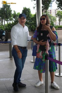 actress bipasha basu and her husband karan singh grover bump into anupam kher at mumbai airport on july 10, 2023