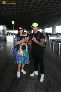 actress bipasha basu and her husband karan singh grover bump into anupam kher at mumbai airport on july 10, 2023