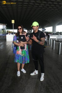 actress bipasha basu and her husband karan singh grover bump into anupam kher at mumbai airport on july 10, 2023