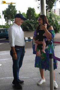 actress bipasha basu and her husband karan singh grover bump into anupam kher at mumbai airport on july 10, 2023