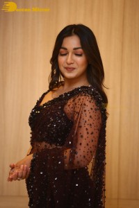 Actress Catherine Tresa dressed in a Black Saree