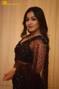 Actress Catherine Tresa dressed in a Black Saree