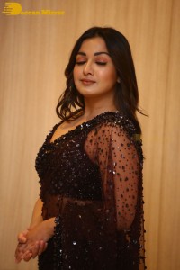Actress Catherine Tresa dressed in a Black Saree