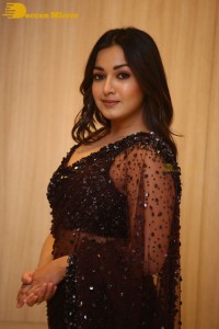 Actress Catherine Tresa dressed in a Black Saree