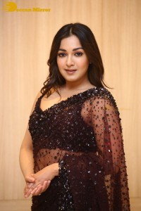 Actress Catherine Tresa dressed in a Black Saree