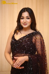 Actress Catherine Tresa dressed in a Black Saree