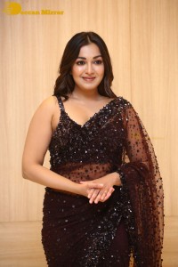 Actress Catherine Tresa dressed in a Black Saree