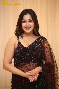 Actress Catherine Tresa dressed in a Black Saree