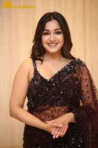 Actress Catherine Tresa dressed in a Black Saree