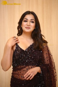 Actress Catherine Tresa dressed in a Black Saree