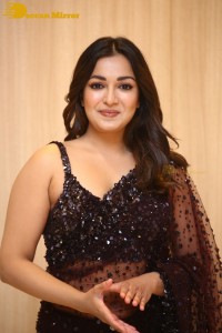 Actress Catherine Tresa dressed in a Black Saree