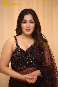 Actress Catherine Tresa dressed in a Black Saree