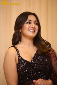 Actress Catherine Tresa dressed in a Black Saree