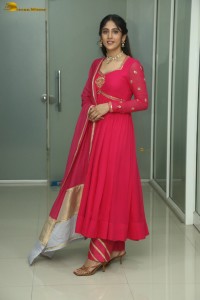 actress Chandini Chowdary photoshoot in a red salwar dress