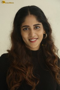 telugu actress Chandini Chowdary cute in a black top and brown skirt