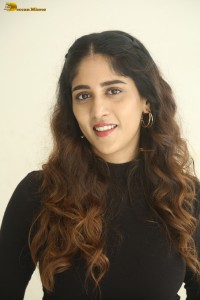 telugu actress Chandini Chowdary cute in a black top and brown skirt