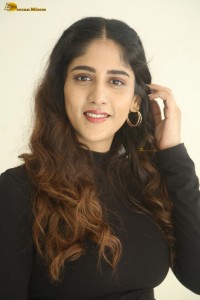 telugu actress Chandini Chowdary cute in a black top and brown skirt