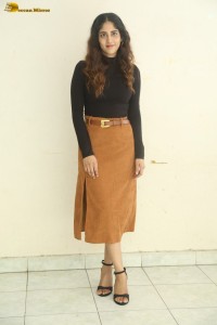 telugu actress Chandini Chowdary cute in a black top and brown skirt