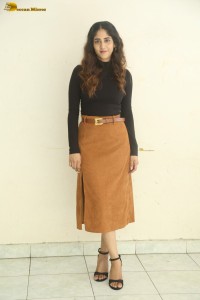 telugu actress Chandini Chowdary cute in a black top and brown skirt