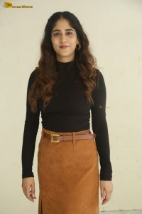 telugu actress Chandini Chowdary cute in a black top and brown skirt