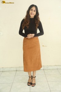 telugu actress Chandini Chowdary cute in a black top and brown skirt