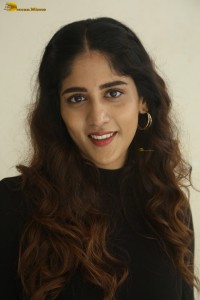 telugu actress Chandini Chowdary cute in a black top and brown skirt