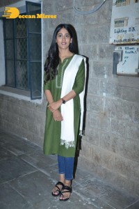 Actress Chandini Chowdary in a green salwar kameez
