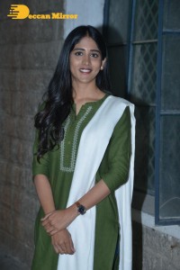 Actress Chandini Chowdary in a green salwar kameez