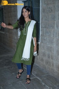 Actress Chandini Chowdary in a green salwar kameez