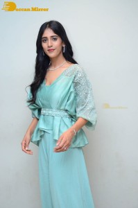 Telugu Actress Chandini Chowdary poses for pictures in a blue dress