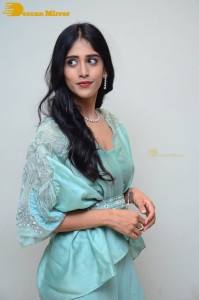 Telugu Actress Chandini Chowdary poses for pictures in a blue dress
