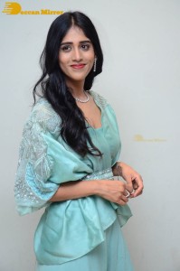 Telugu Actress Chandini Chowdary poses for pictures in a blue dress