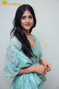 Telugu Actress Chandini Chowdary poses for pictures in a blue dress