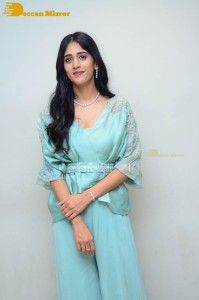 Telugu Actress Chandini Chowdary poses for pictures in a blue dress