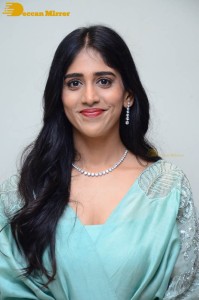 Telugu Actress Chandini Chowdary poses for pictures in a blue dress