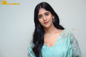 Telugu Actress Chandini Chowdary poses for pictures in a blue dress