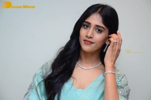 Telugu Actress Chandini Chowdary poses for pictures in a blue dress