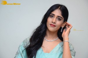 Telugu Actress Chandini Chowdary poses for pictures in a blue dress