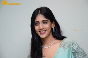 Telugu Actress Chandini Chowdary poses for pictures in a blue dress