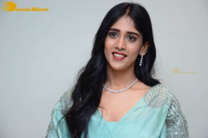 Telugu Actress Chandini Chowdary poses for pictures in a blue dress