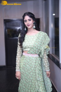 Actress Chandini Chowdary in a green dress