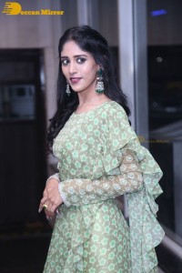 Actress Chandini Chowdary in a green dress
