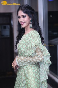 Actress Chandini Chowdary in a green dress