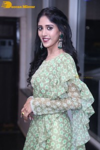 Actress Chandini Chowdary in a green dress