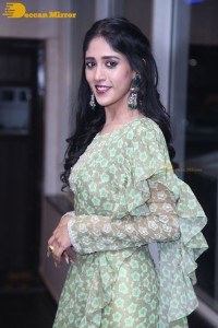 Actress Chandini Chowdary in a green dress