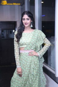 Actress Chandini Chowdary in a green dress
