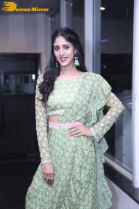 Actress Chandini Chowdary in a green dress