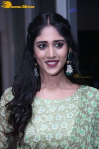 Actress Chandini Chowdary in a green dress